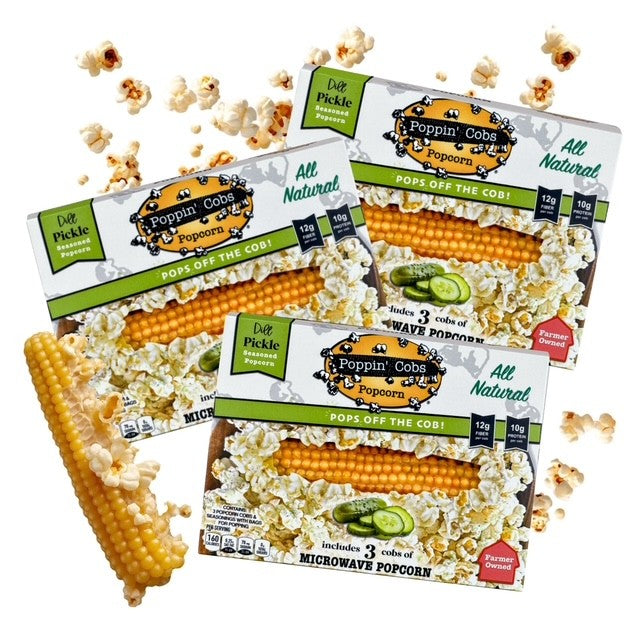 Poppin' Cobs popcorn packages with corn and popcorn on a white background